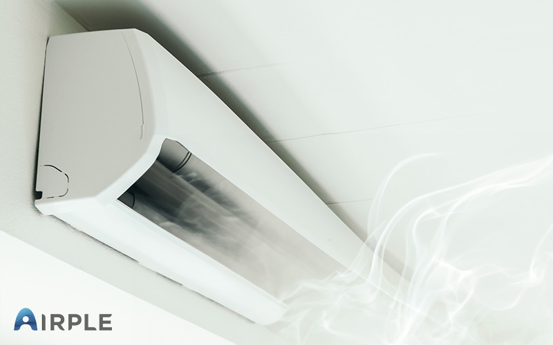 Overheating Aircon producing smoke