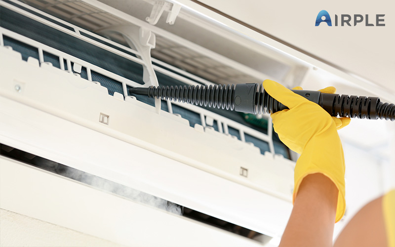 Overheating aircon being cleaned