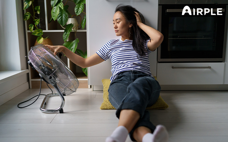 Person feeling uncomfortable at home