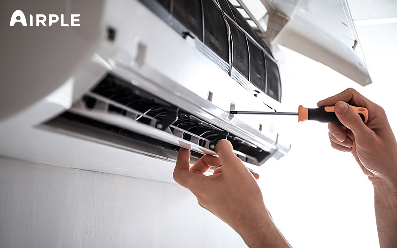 Loosening screws of aircon filter